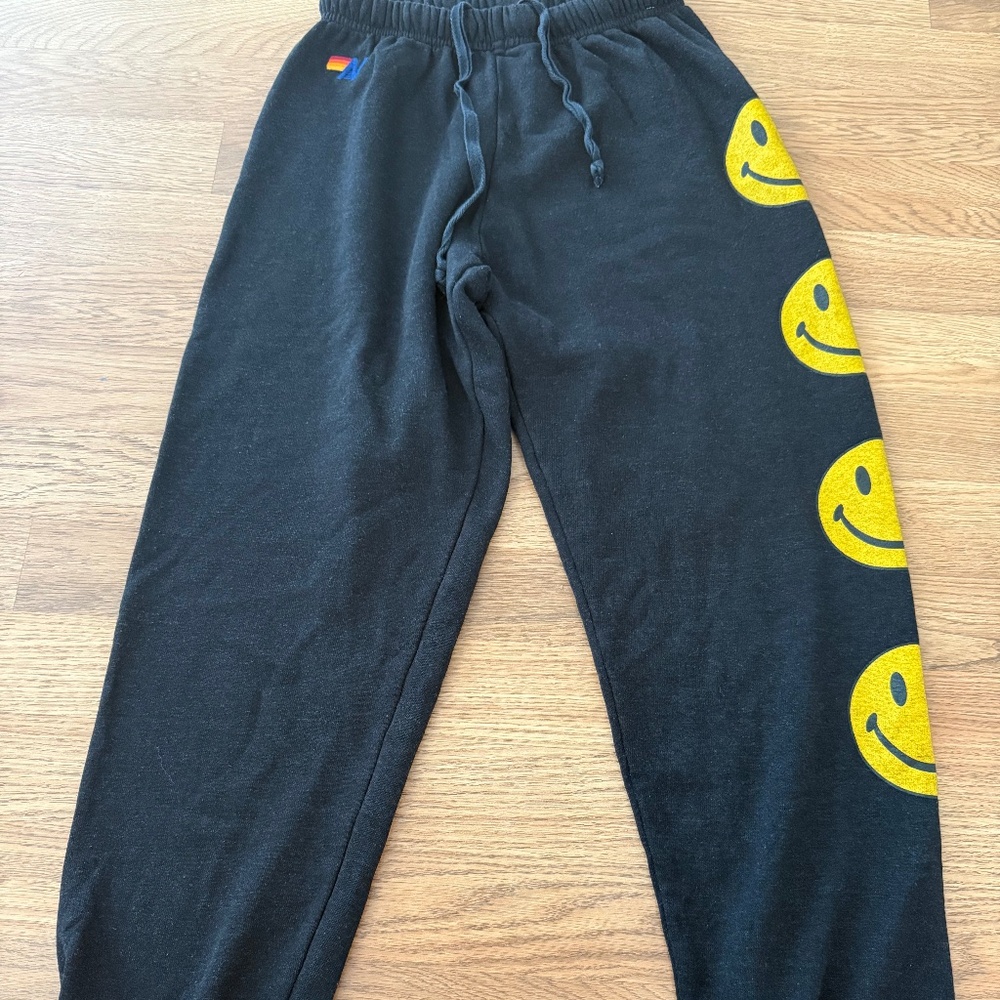 Aviator Nation Black Sweatpants with Yellow Smiley Face Side Graphics